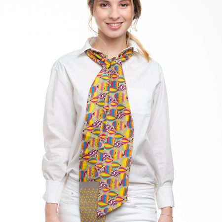 Gray silk twilly scarf with 'Joy' pattern, shown tied around the neck is perfect for you