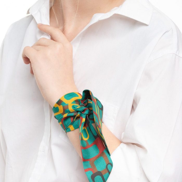 Folded Links silk twilly, highlighting the core concept of connection and individuality through the unique rectangular shapes. Barcelona design.