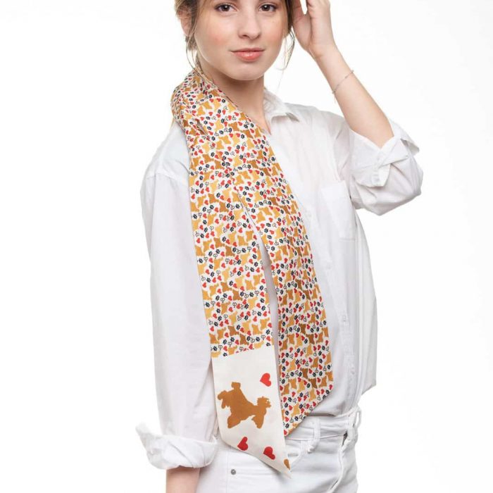 Close-up of the Camila Pet Inspired Silk Twilly showing the vibrant colors and detailed pattern.