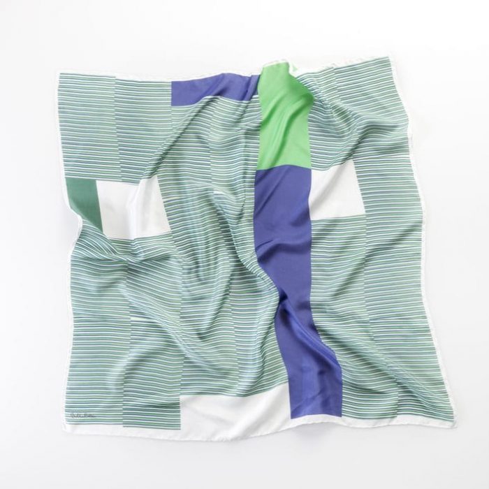 Abstract image of the 'Farewell' scarf, capturing the experimentation with color flowing from the vertical panels, a modern design.