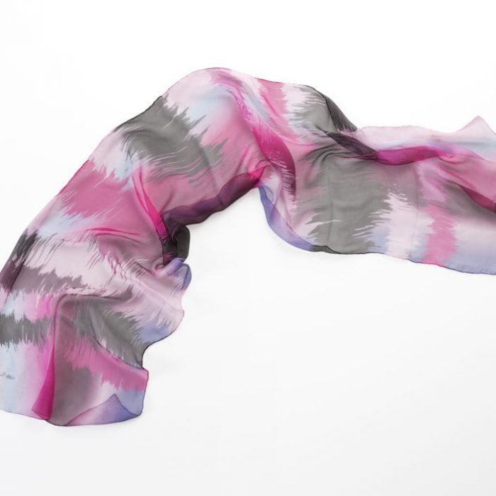 Sunset silk twill scarf in a pink colorway, featuring emphatic transitions of pink, coral, and violet tones. Designer luxury accessory.