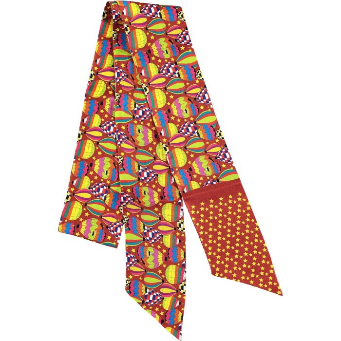 Intricate details of the 'Joy' pattern on the solid brown silk twilly.