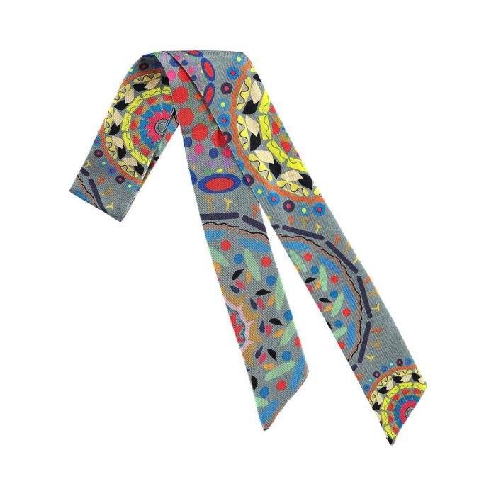 Stacked collection of Gratitude twillies, focusing on the vibrancy of the grey and red circles. Timeless silk accessory for collectors.