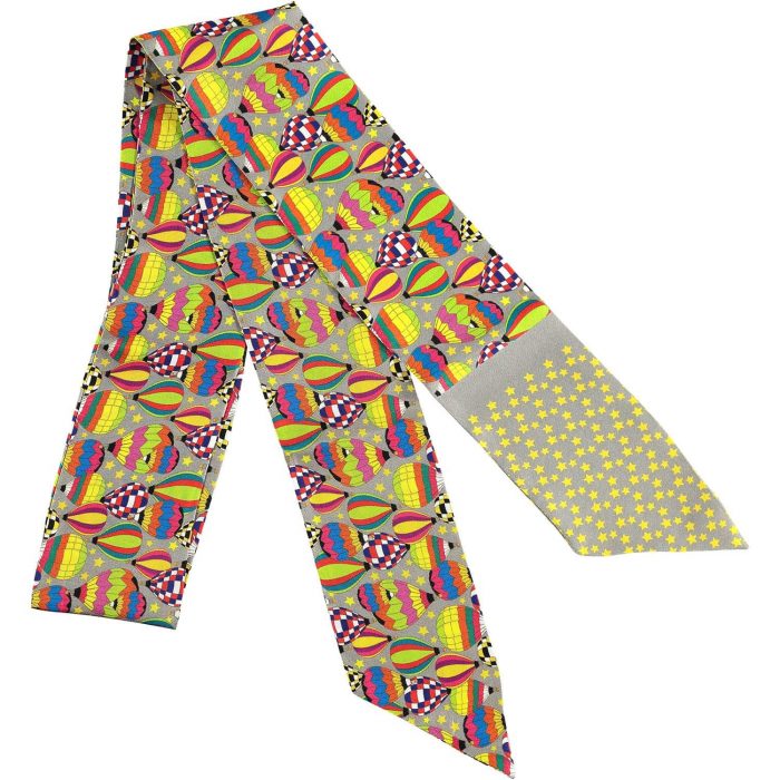 Folded gray silk twilly scarf. It comes in a luxury packaging perfect to gift